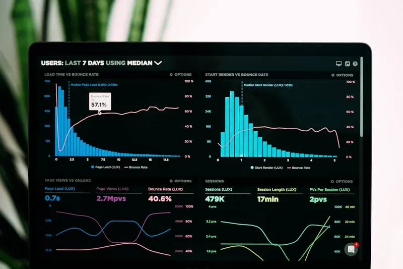 Trading-desk monitors displaying a long-term price chart, illustrating UK institutional Bitcoin adoption trends